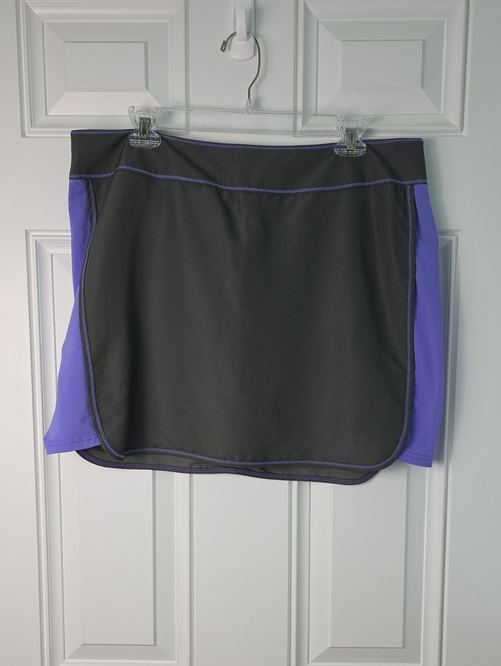 Antigua Women's Black Skort with Purple Trim.  Size 12